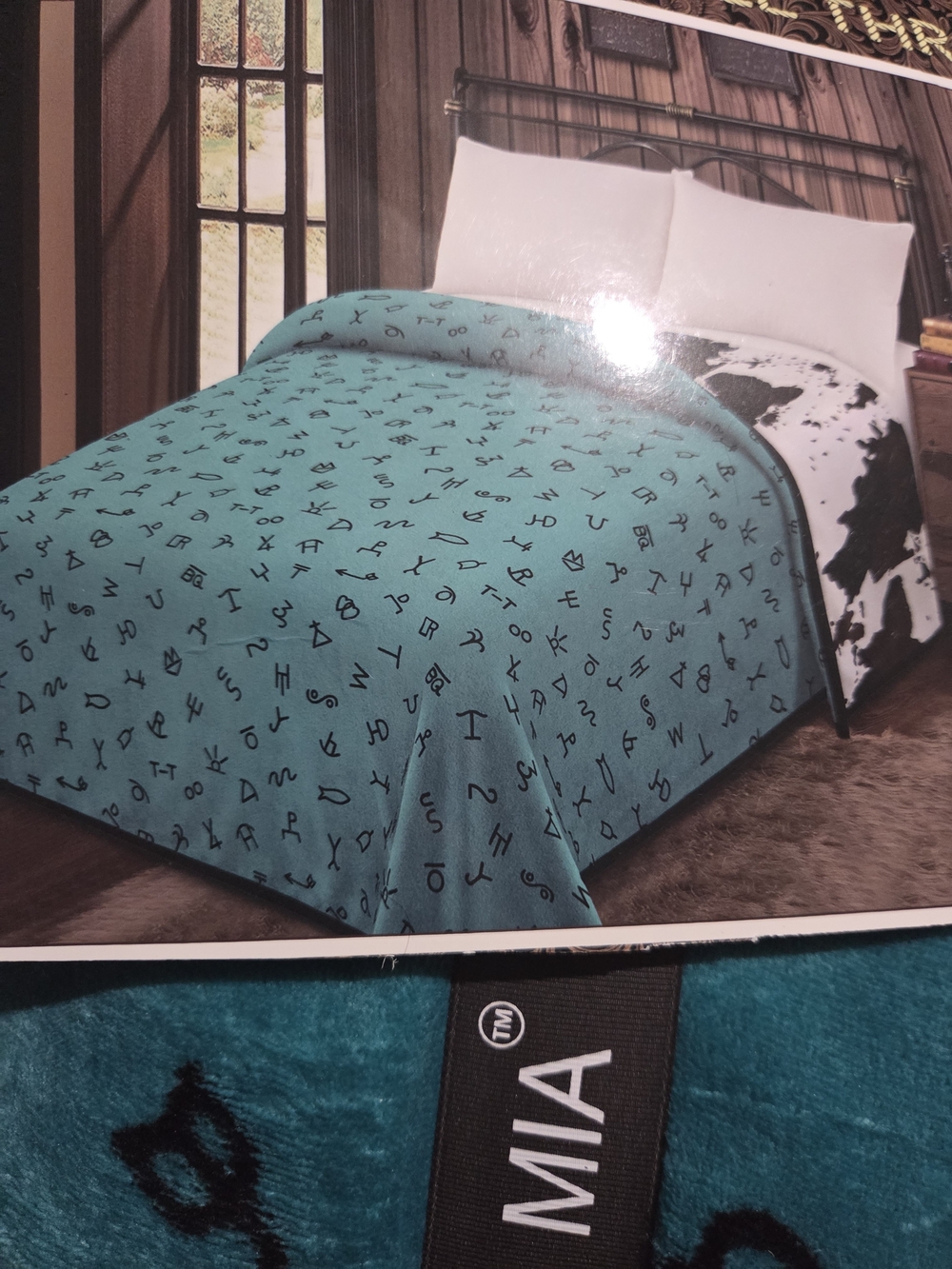 MIA Teal Comforter with Black Symbol Print